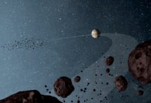 Jupiter föddes långt ut i solsystemet – det avslöjar jättens stora familj Jupiters följeslagare enligt NASA:s rymdkonstnär NASA/JPL-Caltech